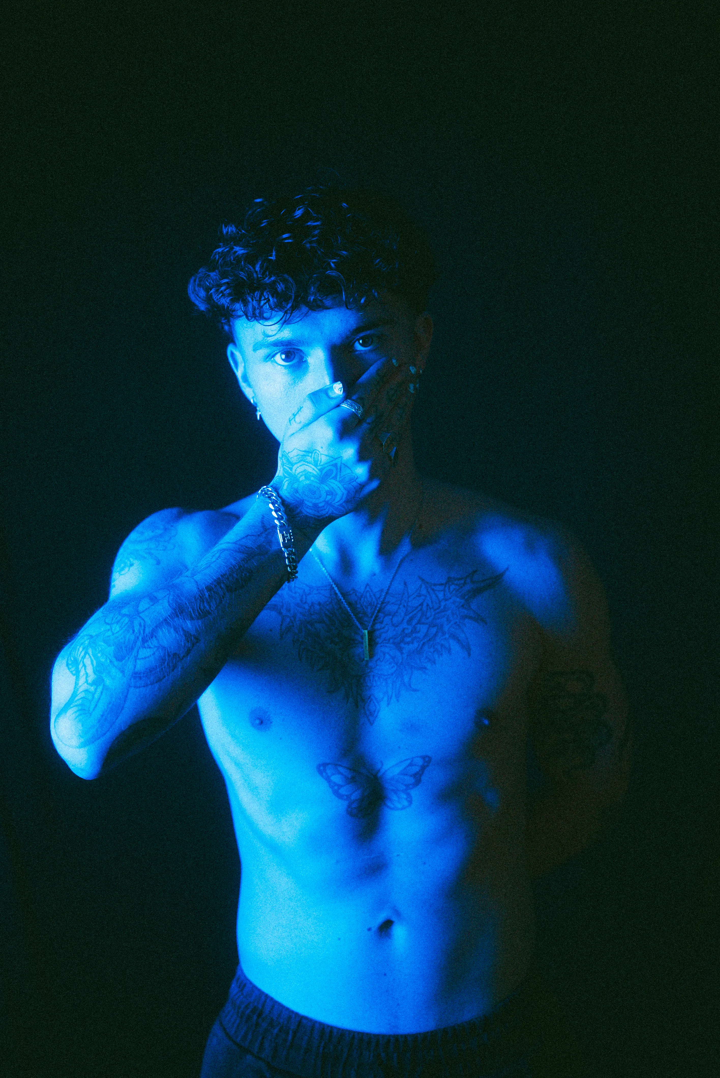 Revoxx in blue-lit studio